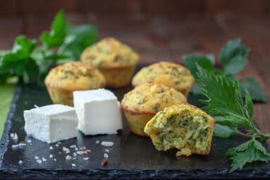 Fresh,Homemade,Muffins,With,Cheese,And,Nettle,On,Wooden,Table.
