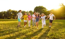 Happy,Children,Playing,In,The,Park,In,Summer.,Group,Of