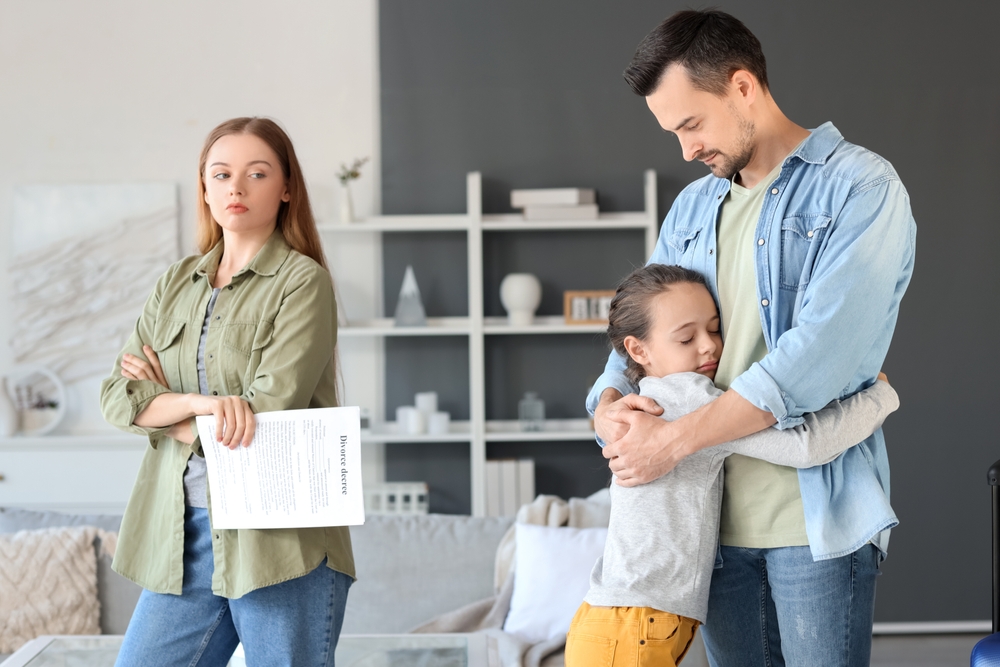 Little,Girl,Hugging,Her,Father,After,Divorce,At,Home