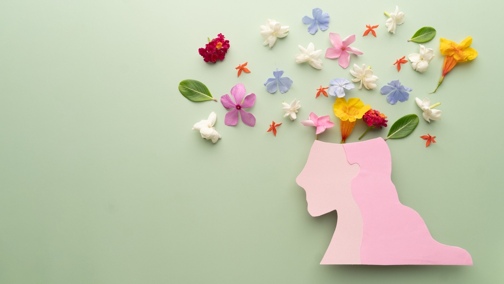 Mental,Health,Awareness,Month.,Woman,Head,With,Colorful,Fresh,Flower