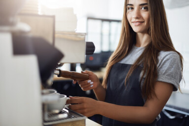 Portrait,Of,Young,Lady,Barista,Using,A,Coffee,Machine,To
