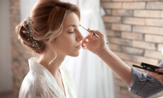 Makeup,Artist,Preparing,Bride,Before,Her,Wedding,In,Room