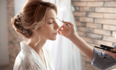Makeup,Artist,Preparing,Bride,Before,Her,Wedding,In,Room