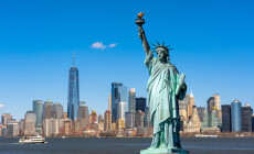 The,Statue,Of,Liberty,Over,The,Scene,Of,New,York