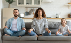 Horizontal,Banner,Serene,Couple,And,Little,Daughter,Sitting,On,Sofa