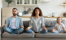 Horizontal,Banner,Serene,Couple,And,Little,Daughter,Sitting,On,Sofa