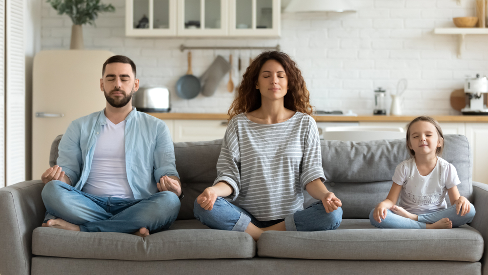 Horizontal,Banner,Serene,Couple,And,Little,Daughter,Sitting,On,Sofa