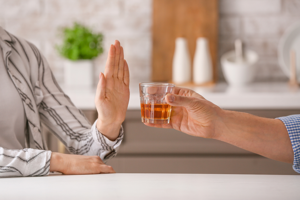 Woman,Refusing,To,Drink,Whiskey,At,Home.,Concept,Of,Alcoholism