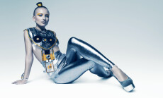 Space,Woman,Sitting,On,The,Floor