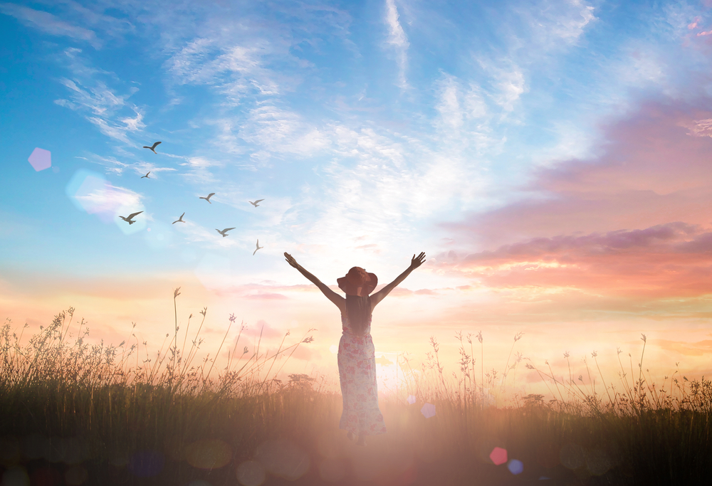 Surrender,And,Praising,Concept:,Silhouette,Of,Healthy,Christian,Woman,Raised
