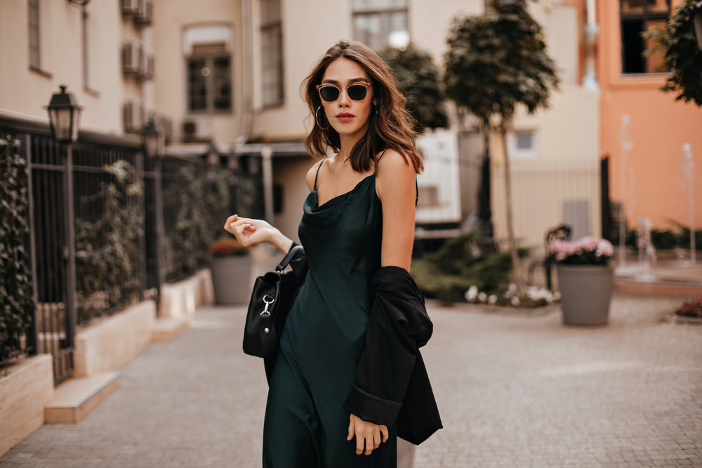 Fashionable,Pale,Brunette,In,Long,Green,Dress,,Black,Jacket,And
