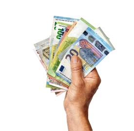 Man's,Hand,Holds,Euro,Money,Isolated,On,White,Background.,Business