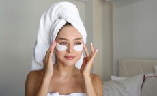 Young,Woman,Wearing,A,Towel,After,Showering,,Pampering,The,Under