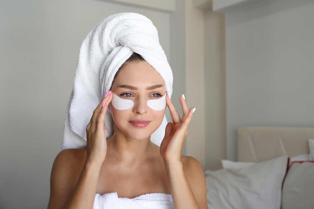 Young,Woman,Wearing,A,Towel,After,Showering,,Pampering,The,Under