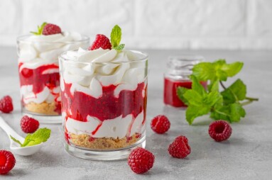 Raspberry,Trifle,With,Whipped,Cream,,Berry,Sauce,,Cookie,Crumbs,And