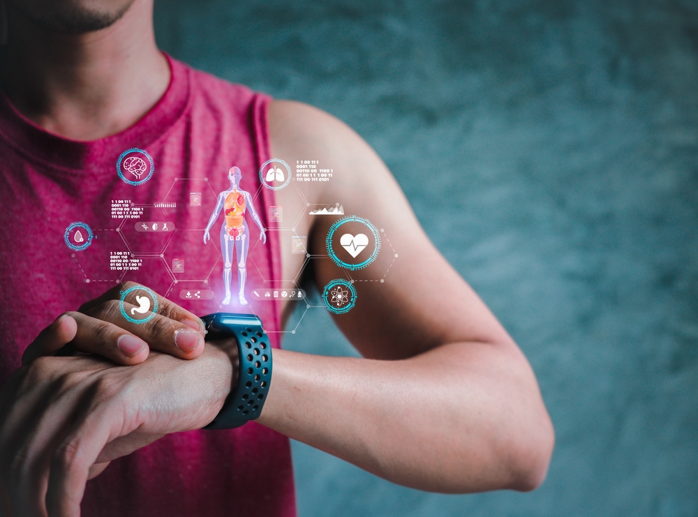 Mid,Adult,Man,Using,Smart,Watch,During,Training.,Heart,Monitor