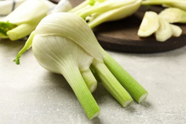 Whole,And,Cut,Fennel,Bulb,On,Light,Gray,Table,,Closeup
