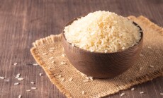 Uncooked,White,Rice,In,A,Wooden,Bowl.,Healthy,Cereal,Concept.