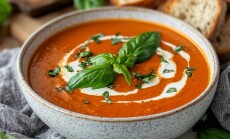 Creamy,Tomato,Soup,With,Basil,And,Swirls,Of,Cream
