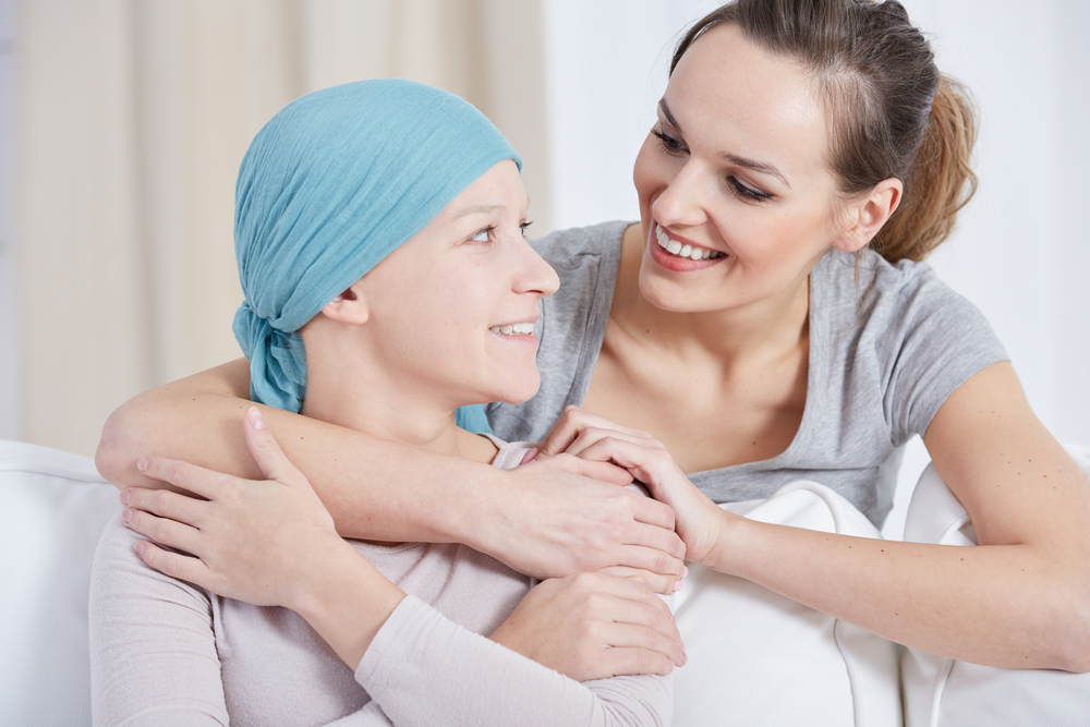 Young,Woman,With,Blue,Headscarf,Looking,And,Smiling,At,Her