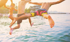 Group,Of,Happy,Crazy,People,Having,Fun,Jumping,In,The