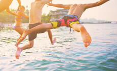 Group,Of,Happy,Crazy,People,Having,Fun,Jumping,In,The
