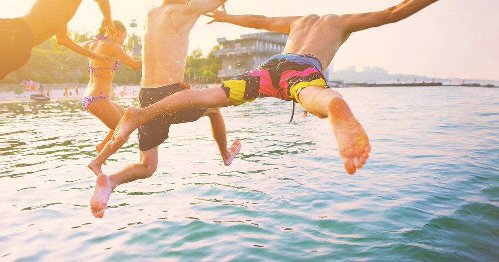 Group,Of,Happy,Crazy,People,Having,Fun,Jumping,In,The