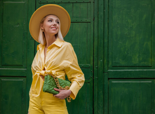 Street,Fashion,Portrait,Of,Happy,Smiling,Woman,Wearing,Total,Yellow