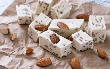 Walnut,Halva,With,Almonds,And,Sunflower,Seeds,On,Brown,Craft