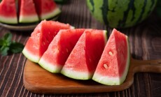 Slices,Of,Fresh,Watermelon,On,The,Rustic,Wooden,Table