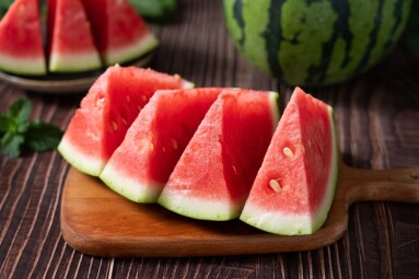 Slices,Of,Fresh,Watermelon,On,The,Rustic,Wooden,Table