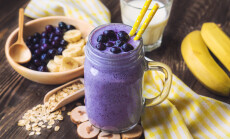 Blueberry,Smoothie,With,Banana,And,Oat,Flakes,In,Jar,On