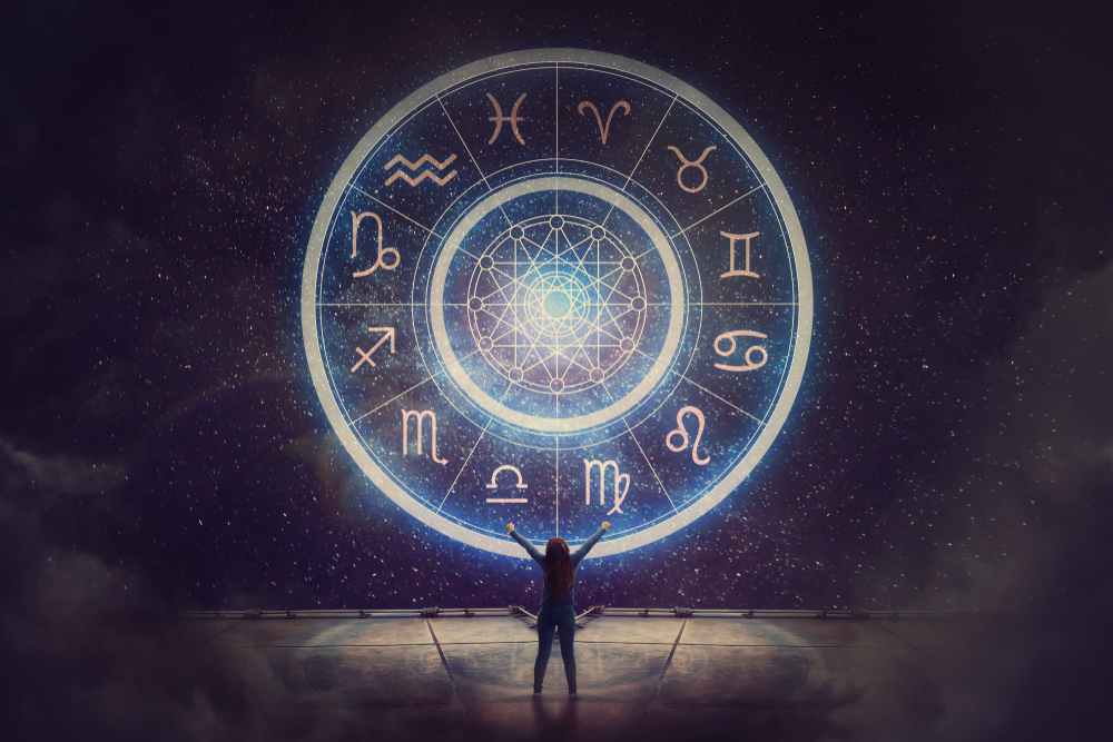 Woman,Raising,Hands,Looking,At,The,Night,Sky.,Astrological,Wheel