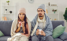 Dissatisfied,Young,Couple,Having,Problem,With,Central,Heating,,Sitting,On