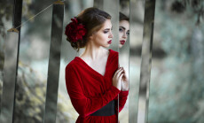 Mysterious,Girl,In,A,Long,Red,Dress,Watch,Mirrors,In