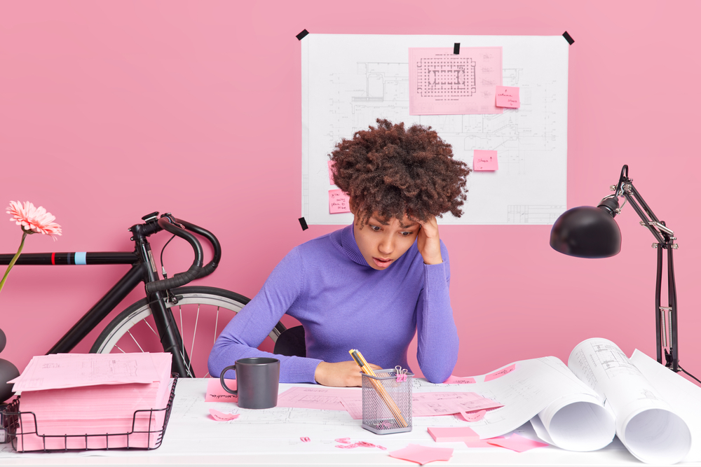 Puzzled,Woman,Architect,Improves,Graphics,Corrects,Mistakes,Busy,Working,On