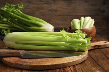 Fresh,Green,Celery,Bunches,And,Knife,On,Wooden,Table