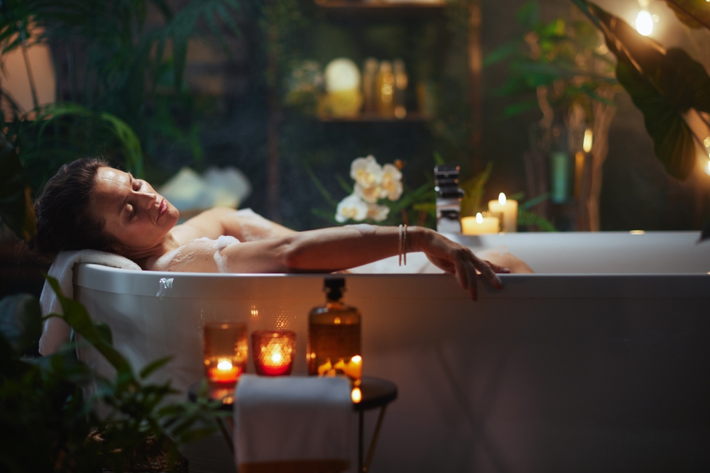 A,Middle-aged,Woman,Unwinds,In,A,Luxurious,Bubble,Bath,,Eyes