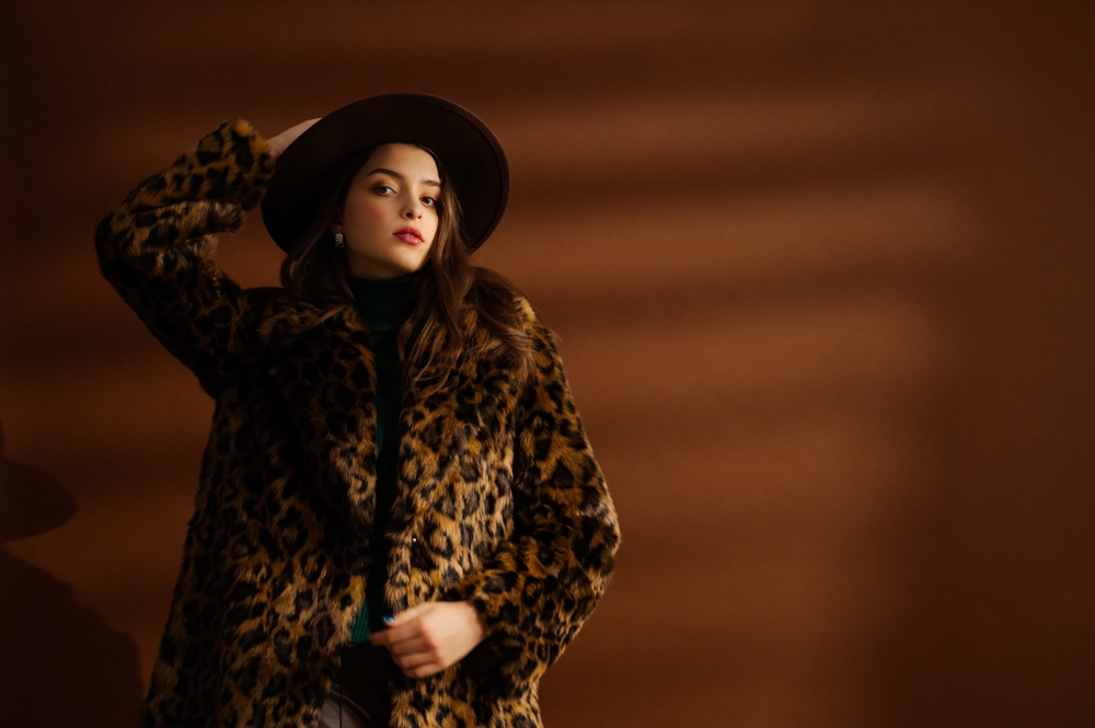 Fashionable,Confident,Woman,Wearing,Hat,,Trendy,Faux,Fur,Leopard,Print