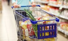 Consumerism,And,People,Concept,-,Woman,With,Shopping,Cart,Or