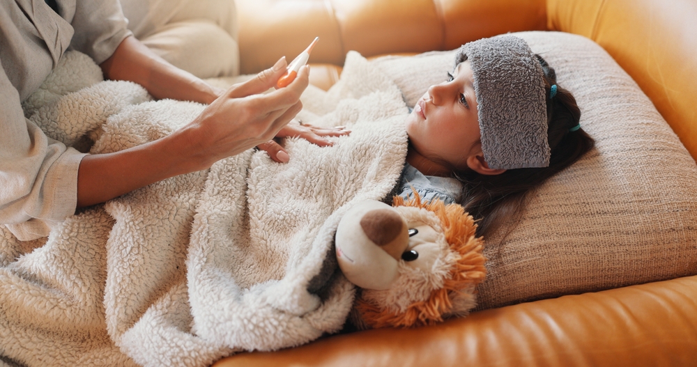 Hands,,Thermometer,And,Mother,With,Sick,Child,In,Home,For