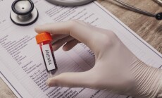 Doctor,Holding,Test,Tube,With,Blood,Sample,And,Label,Anemia