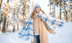 Playing,With,Snow.,Beautiful,Woman,In,A,Hat,And,Scarf