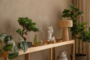 A,Thoughtfully,Styled,Console,Table,With,Ceramic,Vases,,A,Burning