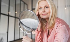 Close,Up,Of,Middle,Age,Caucasian,Woman,In,Sleepwear,Holding