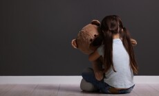 Child,Abuse.,Upset,Little,Girl,With,Teddy,Bear,Sitting,On