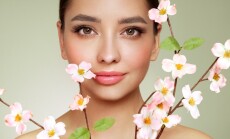Beautiful,Young,Woman,With,A,Cherry,Blossom,Branch.,Model,With