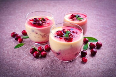 Vanilla,Cream,Dessert,Pudding,With,Cranberry,Sauce,Topping,Served,As
