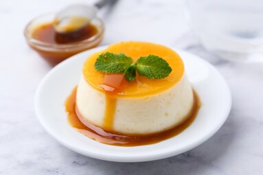 Tasty,Pudding,With,Caramel,Sauce,Served,On,White,Marble,Table,