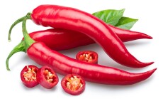 Red,Hot,Chilli,Peppers,,Chili,Slices,And,Green,Leaves,Isolated